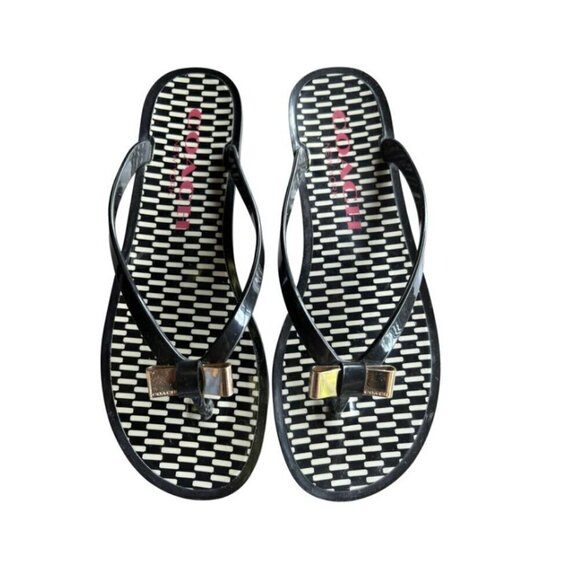 Coach Black Jelly Landon Gold Bow Flip Flops Sandals Flats NWOT - Picture 1 of 6